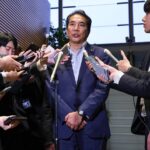 Japanese minister resigns for saying he gets free rice