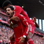 Liverpool go top after edging Arsenal at Anfield